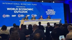 IMF says governments are squeezing savers as debt piles up